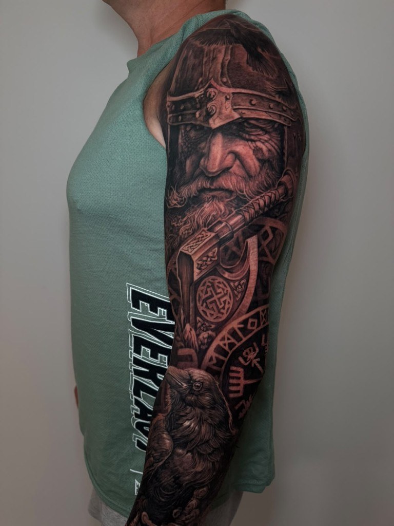 Norse Viking black and grey tattoo sleeve on arm